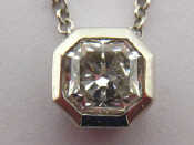 Appraisal: Tiffany Co A platinum Lucida cut diamond solitaire pendant by