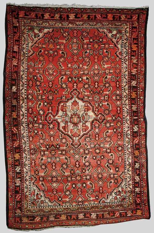 Appraisal: ORIENTAL HAMADAN RUG Rose colored field with center ivory medallion