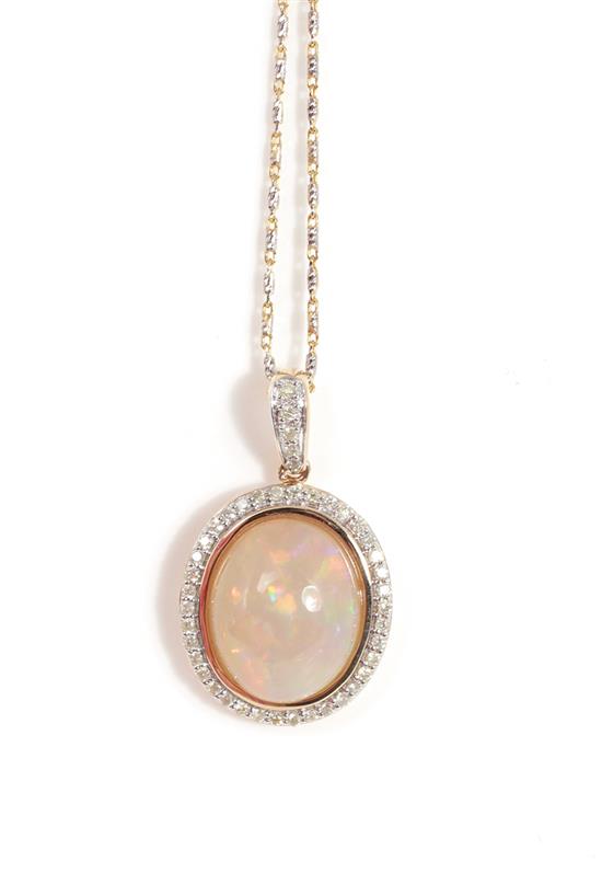 Appraisal: Opal and diamond pendant on chain approx ct oval cabochon