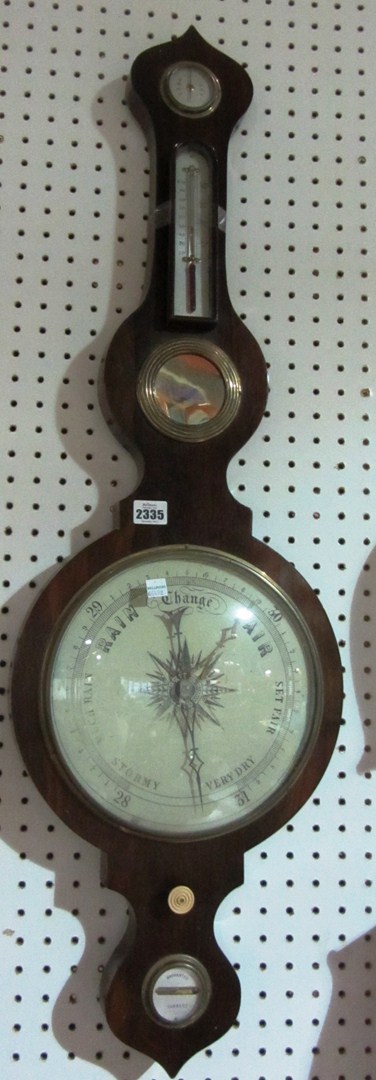 Appraisal: A th century rosewood wheel barometer