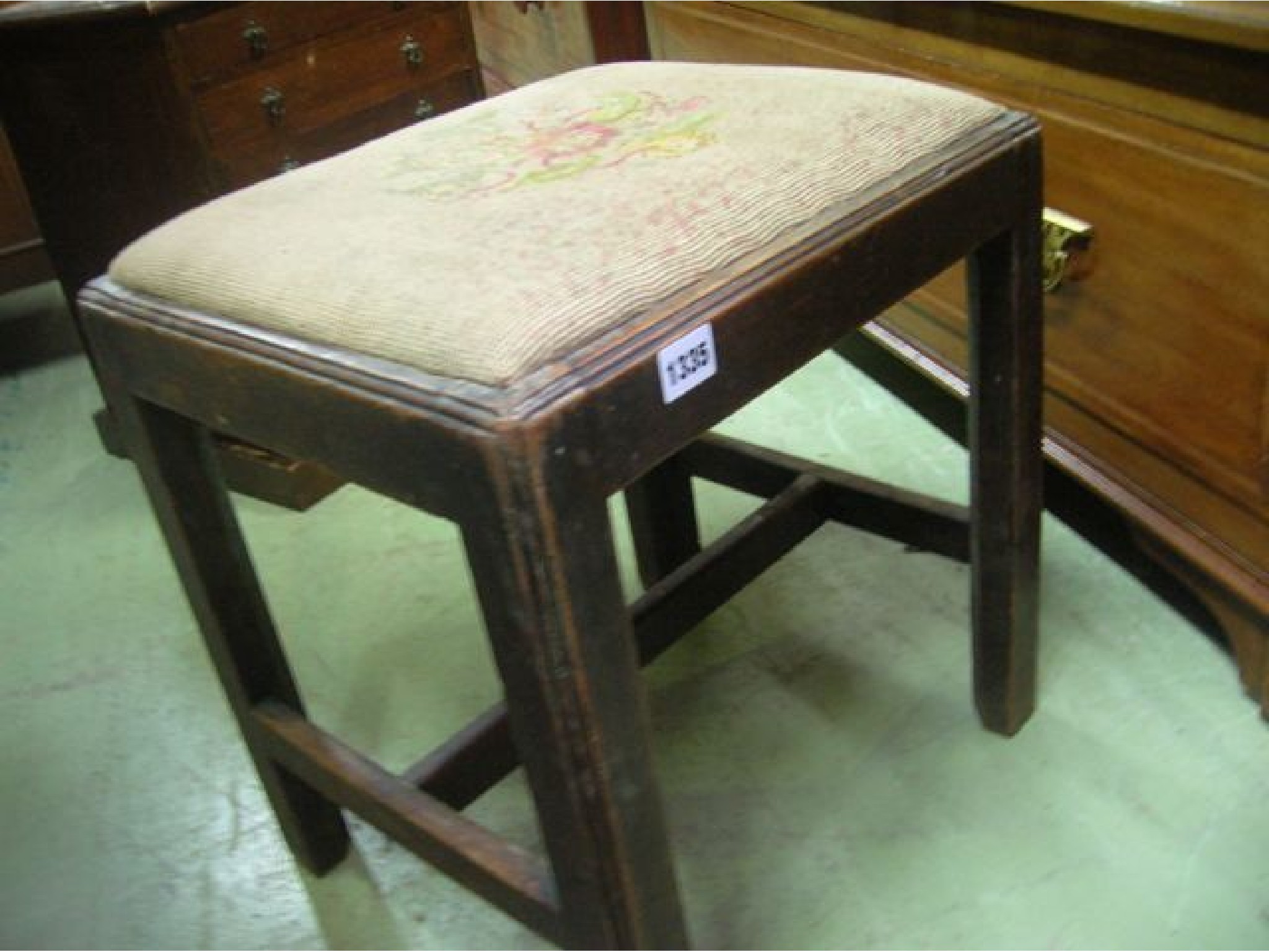 Appraisal: A Georgian mahogany stool of rectangular form with drop in