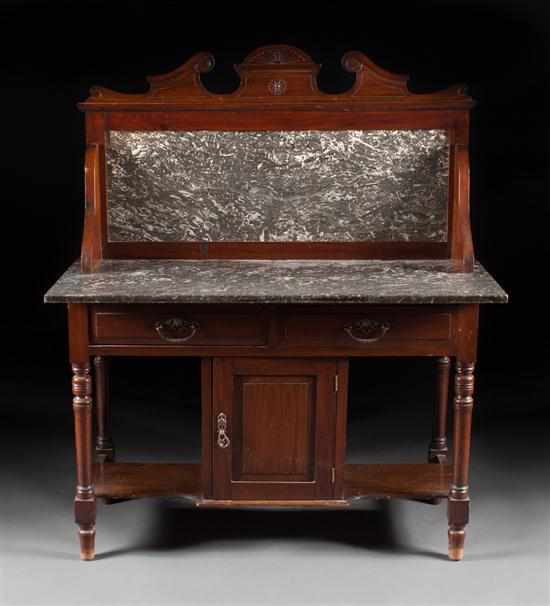 Appraisal: Victorian incised walnut marble top washstand late th century with