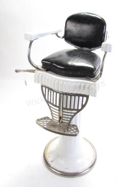 Appraisal: Antique child's barber chair marked Koken white porcelain with nail