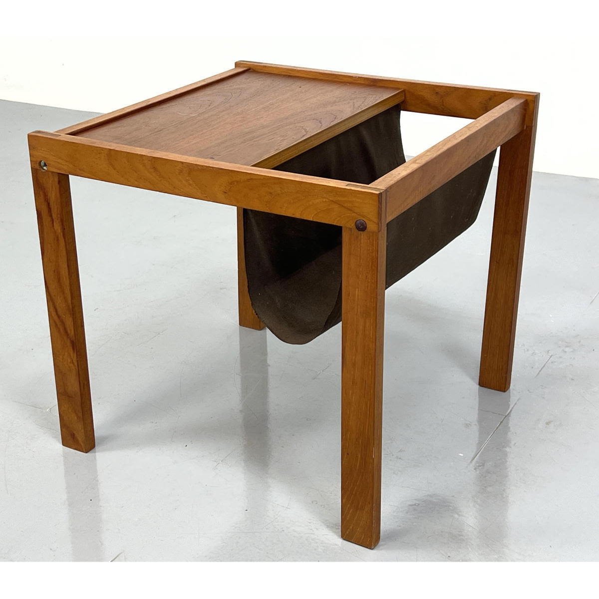 Appraisal: Danish Modern teak sling style magazine rack table Dimensions H