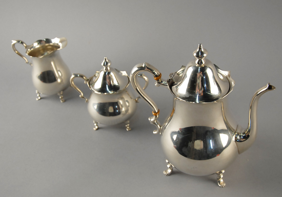 Appraisal: A Three Piece Sterling Tea Service by Preisner to include