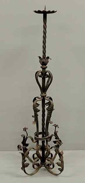 Appraisal: Continental th c standing wrought iron pricket stick with ornate