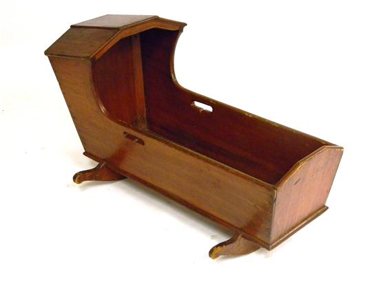 Appraisal: Early child's cradle pine with red stain finish two shaped