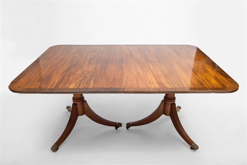 Appraisal: George III Style Mahogany Two-Pedestal Dining Table Fitted with three