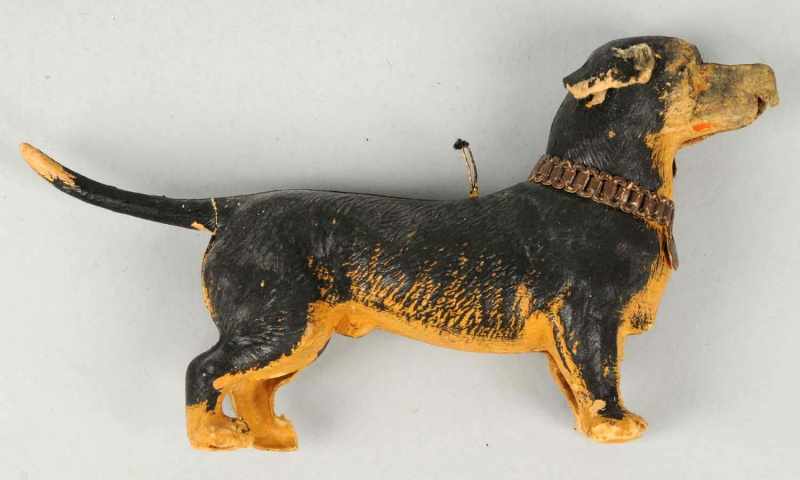 Appraisal: German Dresden Dog Ornament Description Three dimensional Some loss of