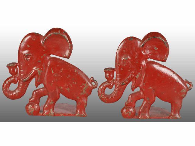 Appraisal: Lot of Elephant Cast Iron Bookends Description Elephant Holding Bell