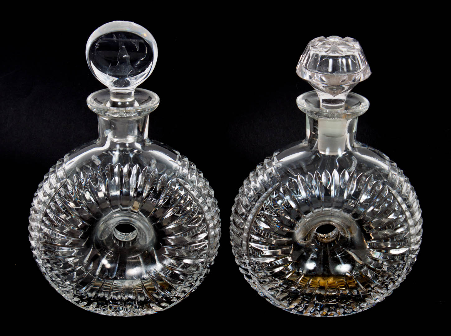 Appraisal: Pair of Anglo- Irish cut crystal donut decanters in H