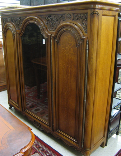 Appraisal: LOUIS XV STYLE OAK CABINET BOOKCASE French early th century