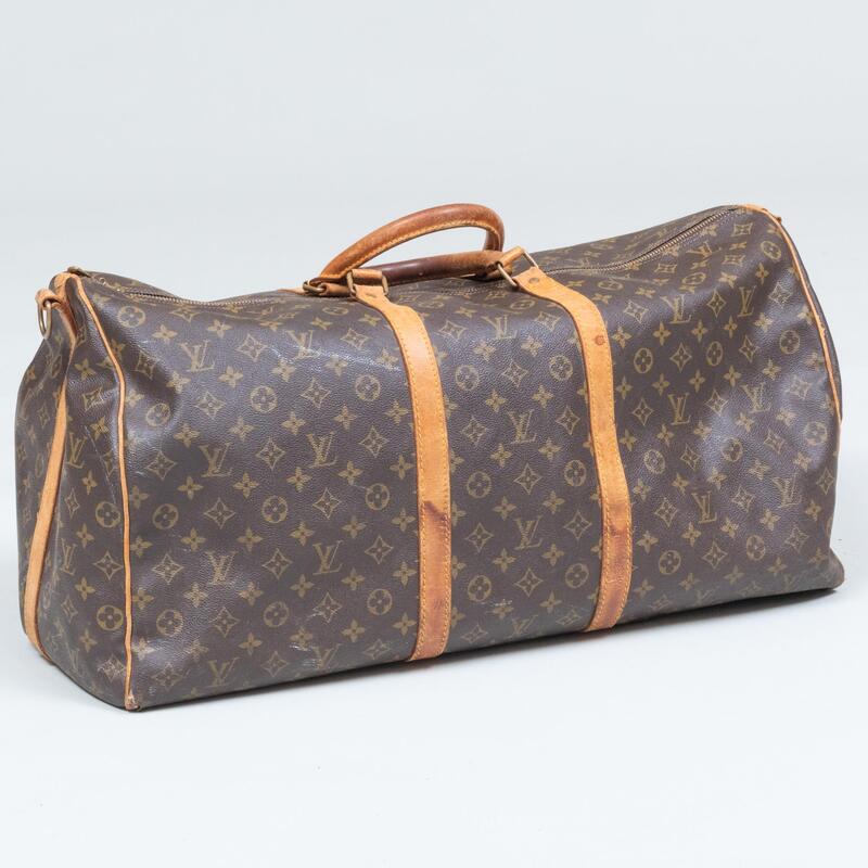 Appraisal: Louis Vuitton Duffle Bag x x in Condition Wear consistent