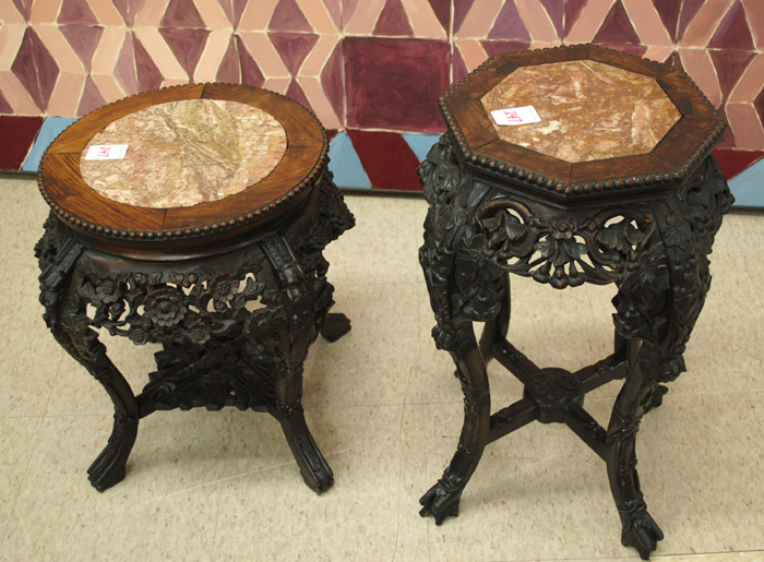 Appraisal: TWO CARVED HONGMU PEDESTAL TABLES Chinese export early th century