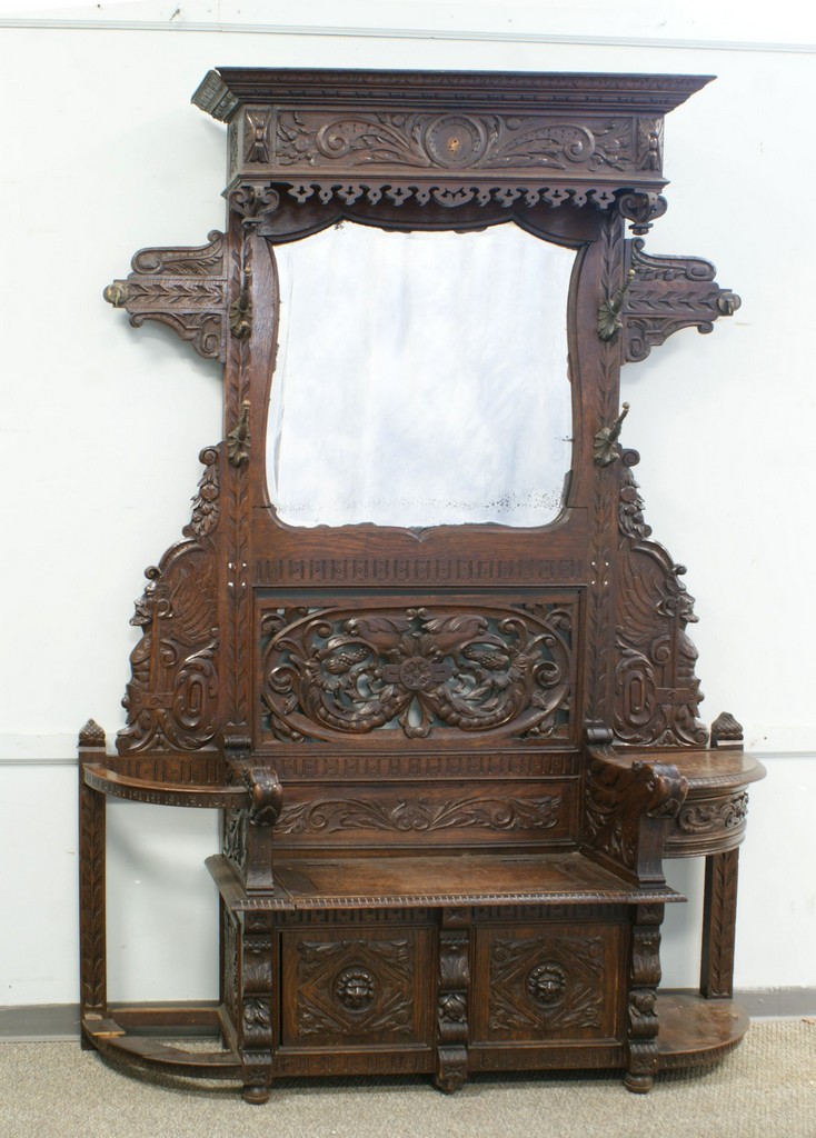 Appraisal: Carved oak Victorian hall rack with hooded top beveled edge