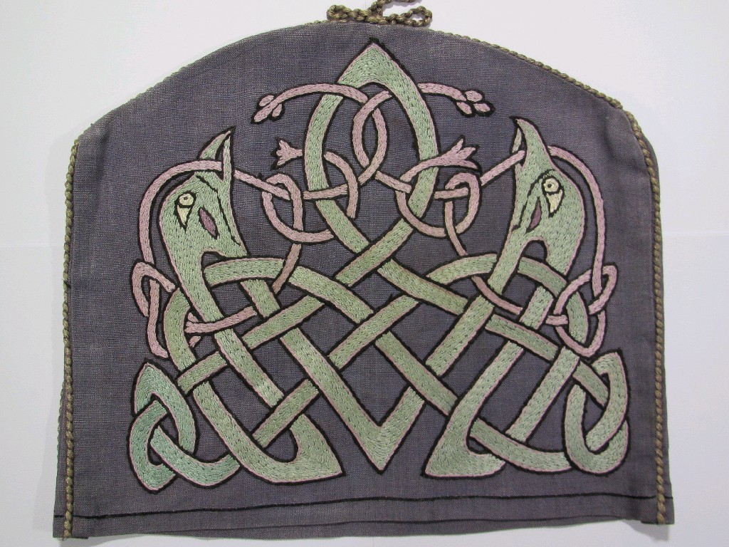 Appraisal: A silk embroidered linen teacosy decorated with entwined serpents two