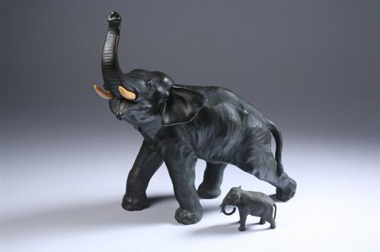 Appraisal: TWO JAPANESE BRONZE ELEPHANTS Meiji period The larger with ivory