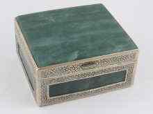 Appraisal: A white metal box set with green hard stone measuring