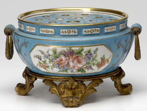 Appraisal: SEVRES Floral decorated porcelain jardiniere with ormolu fittings and stand