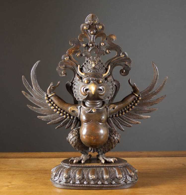 Appraisal: CHINESE BRONZE ANTHROPOMORPHIC SCULPTURE depicting a figure with bird head