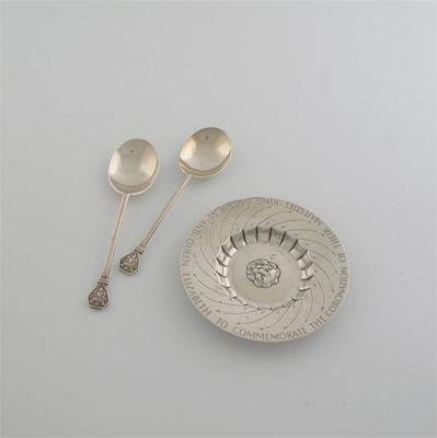 Appraisal: A pair of 'Goldsmiths Hall' spoons by D J Welby