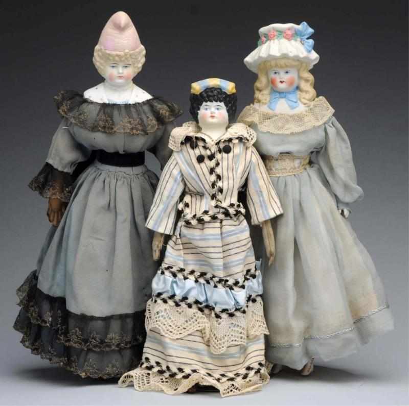 Appraisal: Lot of Bisque Bonnet Dolls All with German bisque shoulder