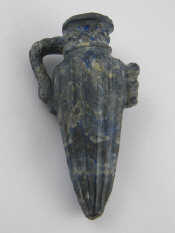 Appraisal: A blue lazurite amphora style vase with bull's head ribbed