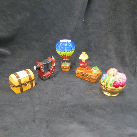 Appraisal: Limoges Porcelain Figural Boxes includes hot air balloon fruit basket