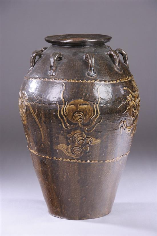 Appraisal: CHINESE BROWN GLAZED STONEWARE STORAGE JAR Ming Dynasty Molded dragon