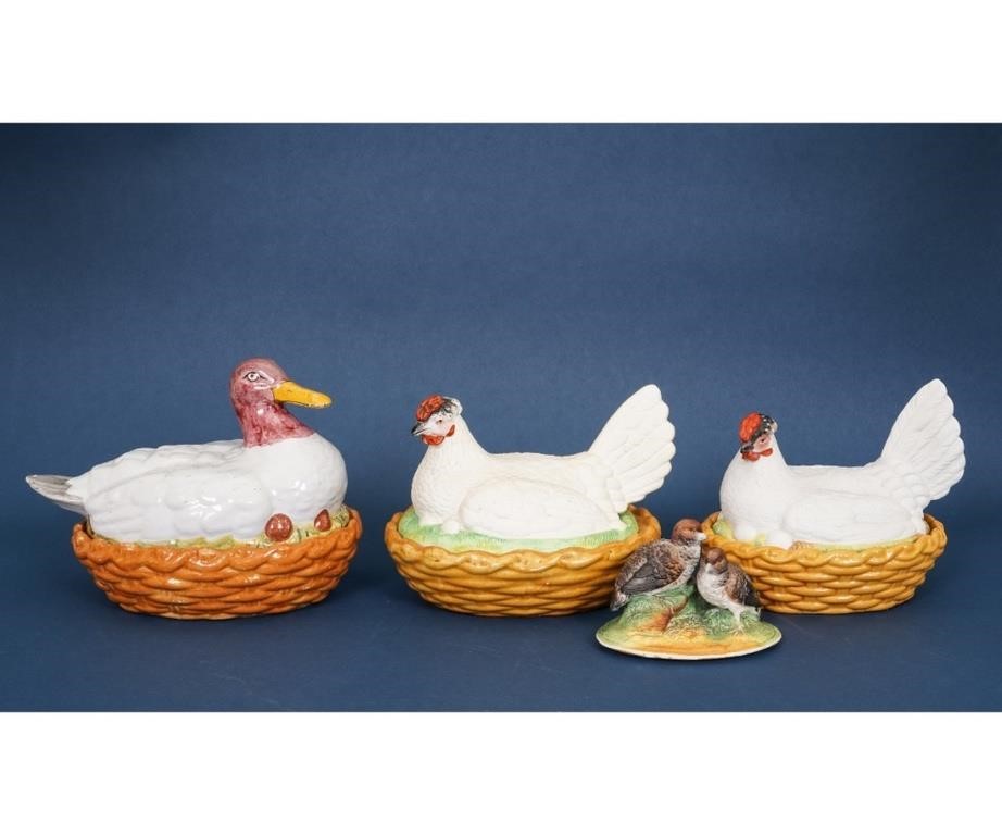 Appraisal: Delft duck-on-nest h x w together with two hen-on-nests and