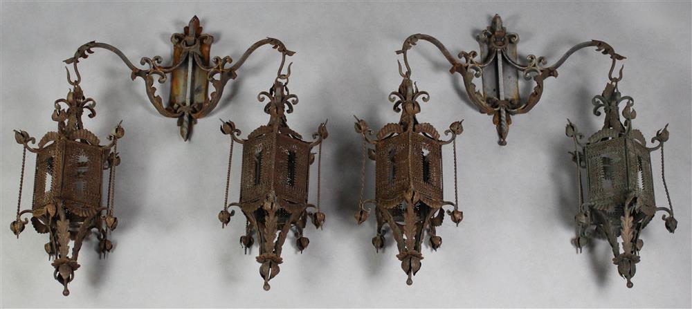 Appraisal: PAIR OF BAROQUE STYLE DOUBLE LIGHT WROUGHT IRON LANTERNS traces