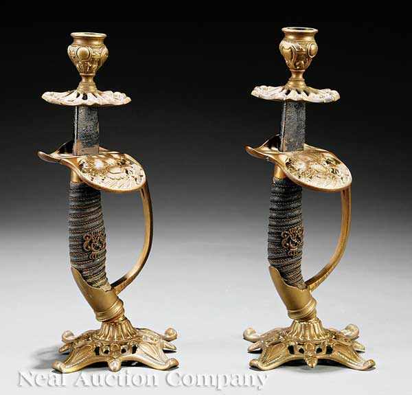 Appraisal: A Pair of Antique English Brass Candlesticks Fashioned from Sword