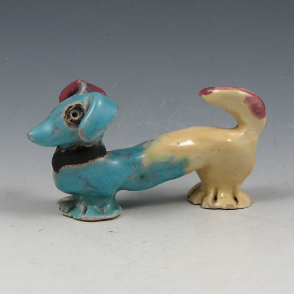 Appraisal: Overbeck Pottery dog figurine with colorful glaze treatment Marked with