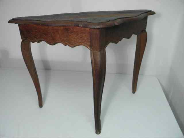 Appraisal: An early French style triangular-shaped side table with cabriole legs