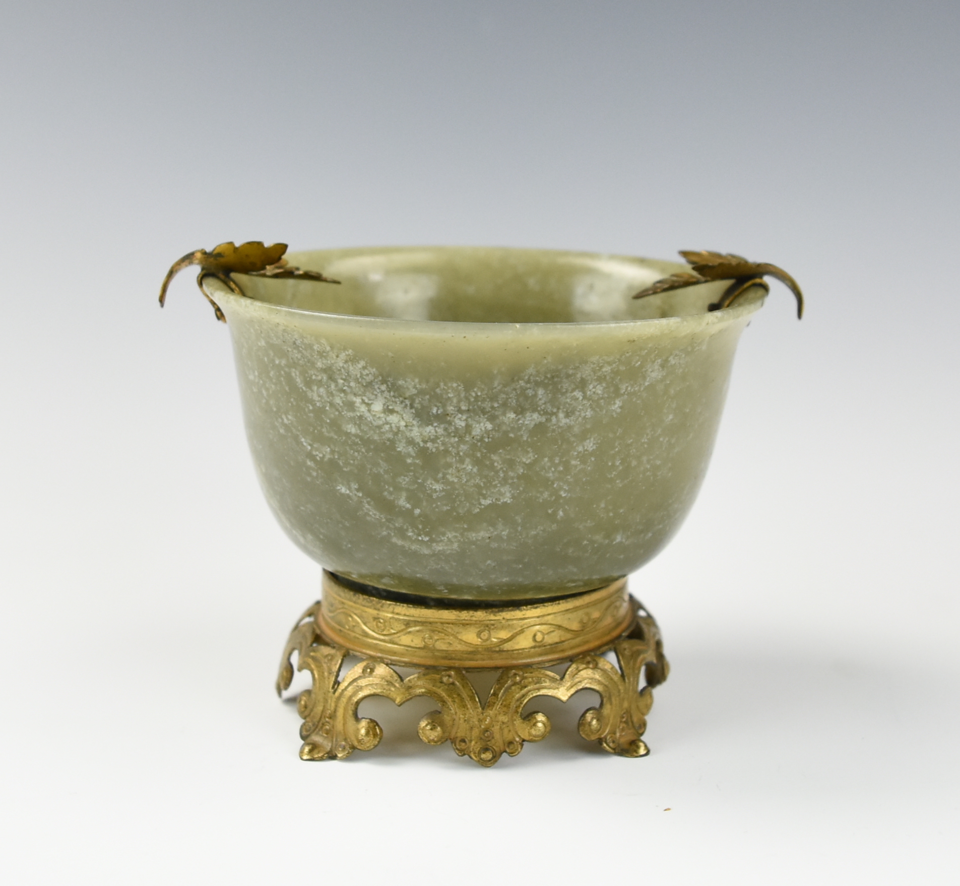 Appraisal: CHINESE GILT-BRONZE MOUNTED JADEITE BOWL TH C A Chinese th