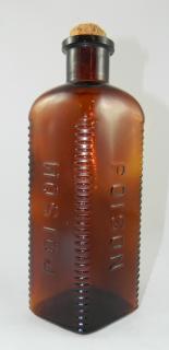 Appraisal: Amber poison bottle Poison- triangular form with rounded back corners