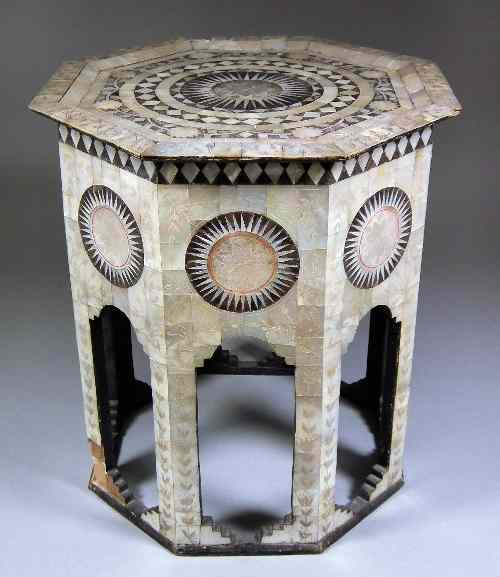 Appraisal: A near Eastern mother of pearl covered octagonal occasional table