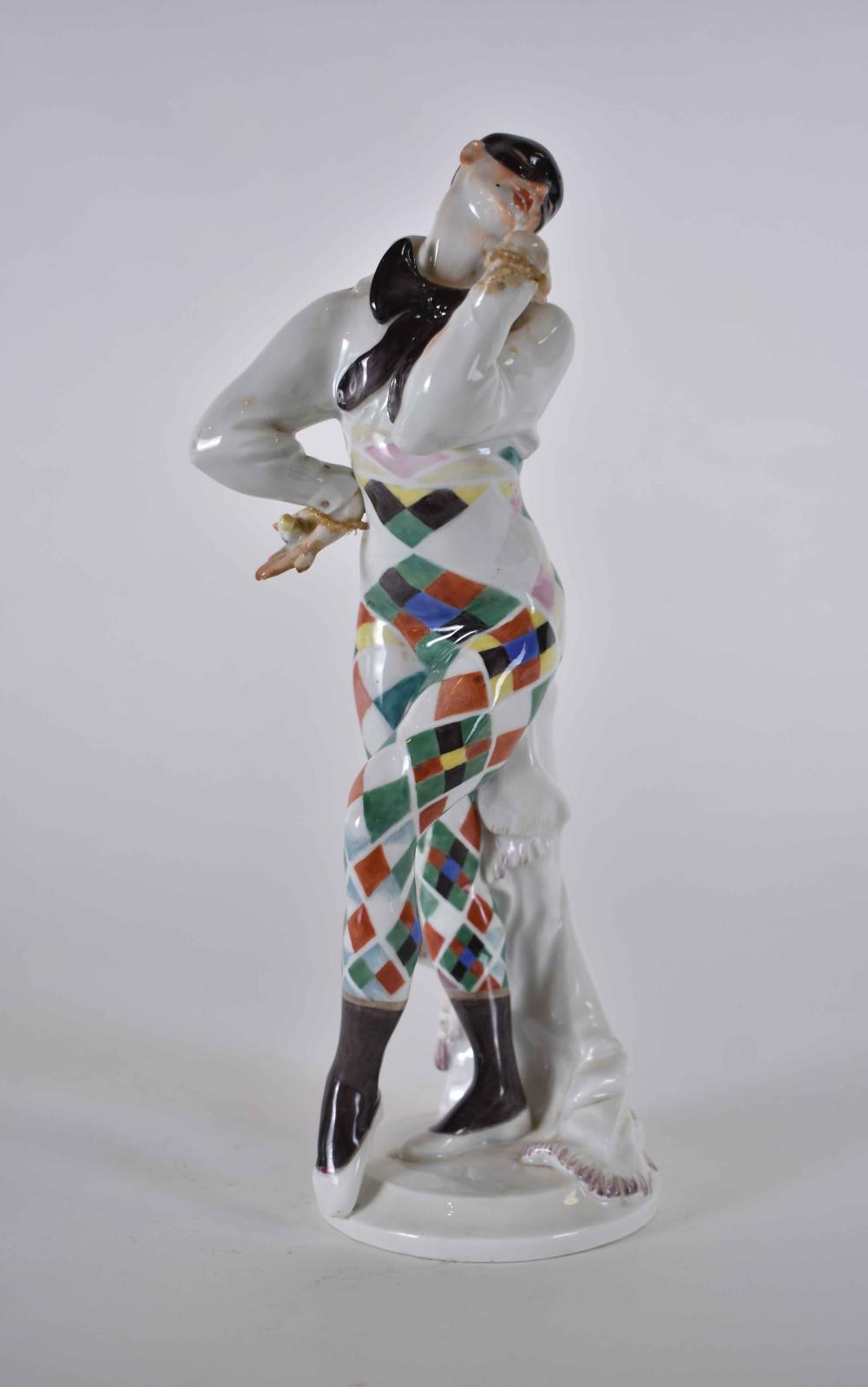 Appraisal: MEISSEN HARLEQUIN FIGURE BY PAUL SCHEURICHThe underside with crossed swords