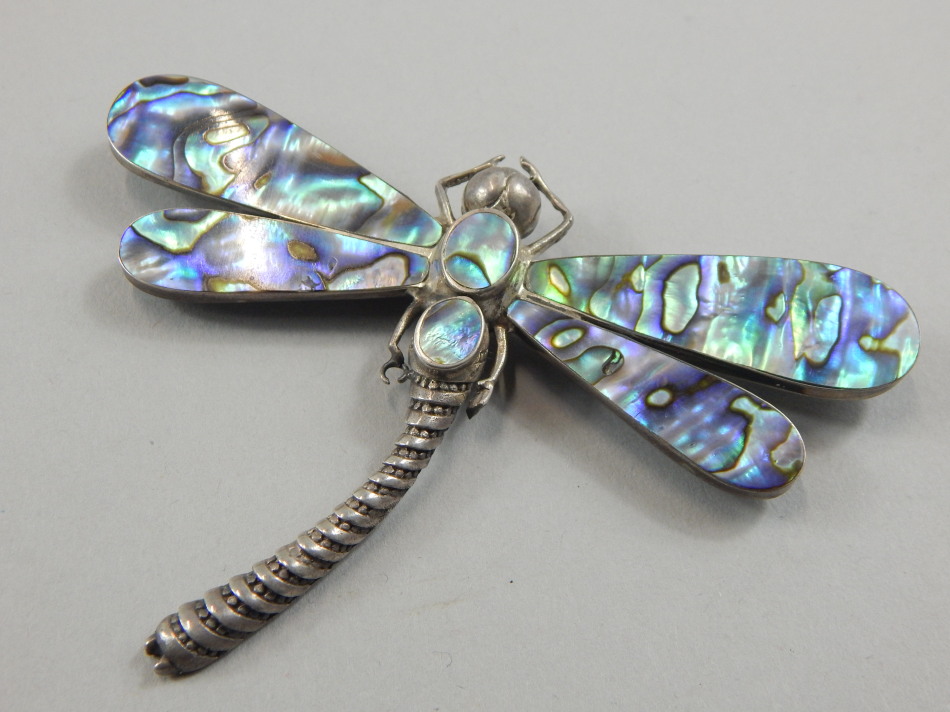 Appraisal: A silver and mother of pearl dragonfly brooch unmarked cm