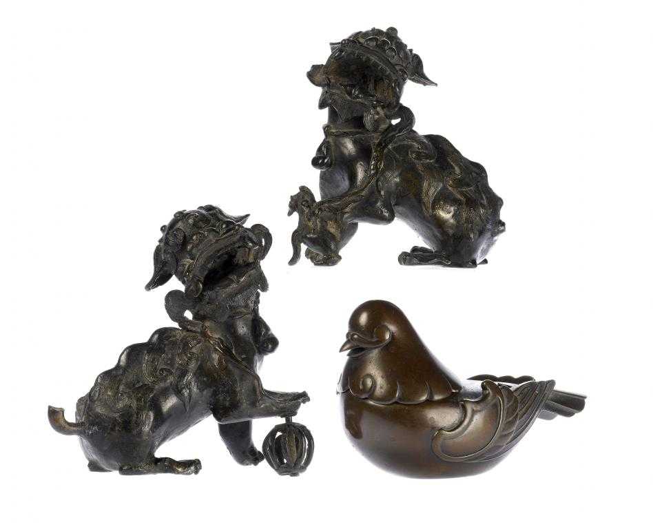 Appraisal: A PAIR OF CHINESE BRONZE DOGS OF FO each snarling