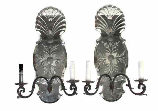 Appraisal: A Pair of Mirrored Two-Light Sconces having a shaped standard