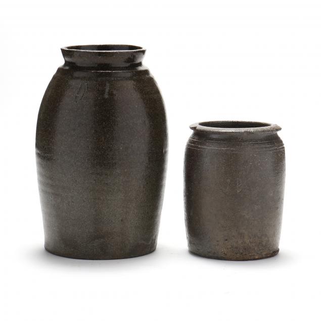 Appraisal: ATTRIBUTED NC TWO SIGNED STONEWARE JARS The first is alkaline