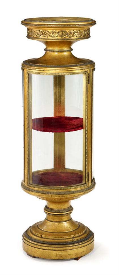 Appraisal: Neo-classical style giltwood cylindrical vitrine late th century The circular