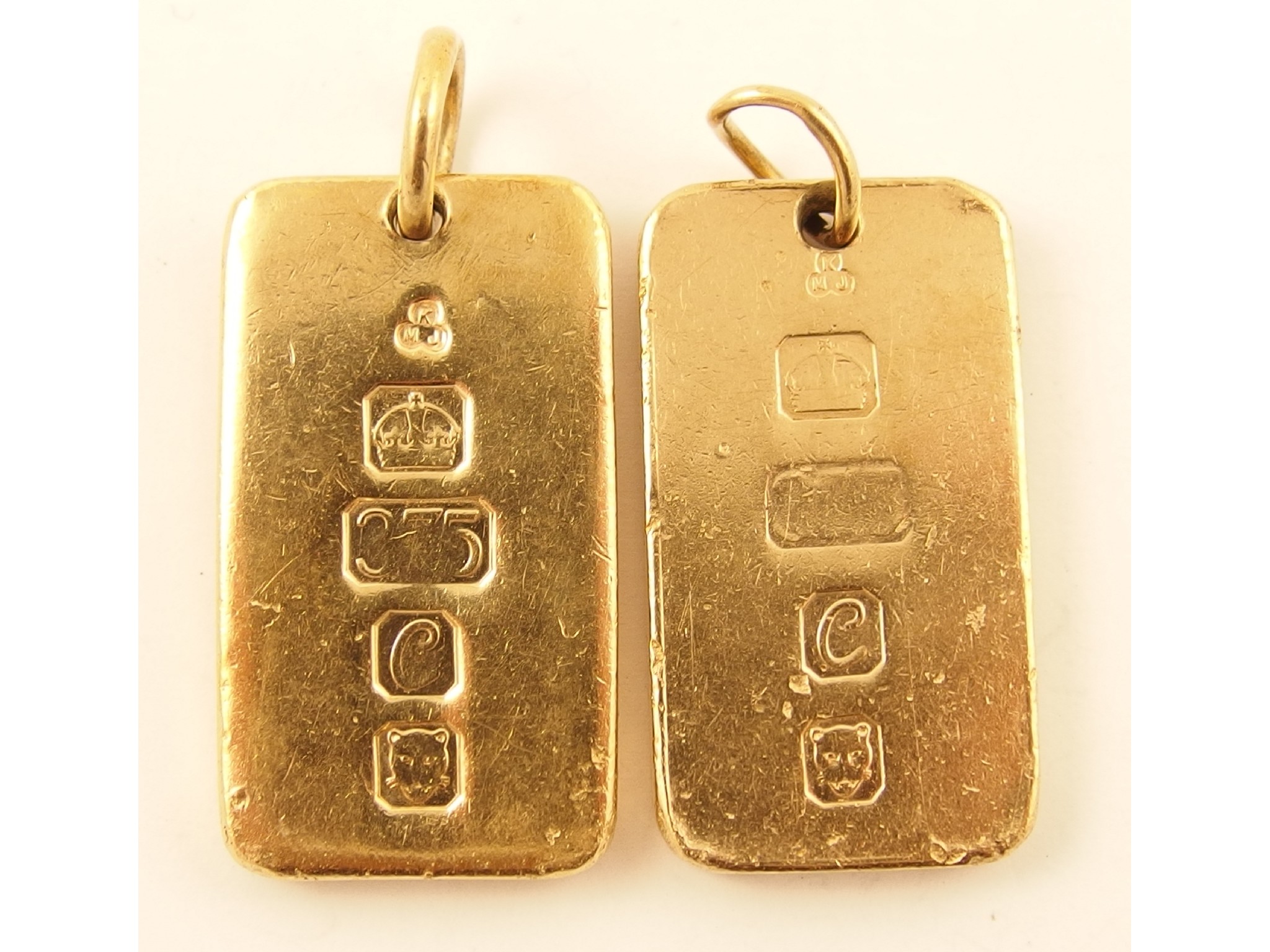 Appraisal: Two ct ingot pendants approx gms