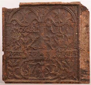 Appraisal: Dated Iron Fireback with Embossed Tulip Decoration Contains illegible names