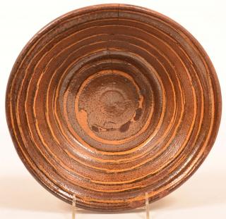 Appraisal: th Century Glazed Redware Bowl Yellow and brown slip concentric