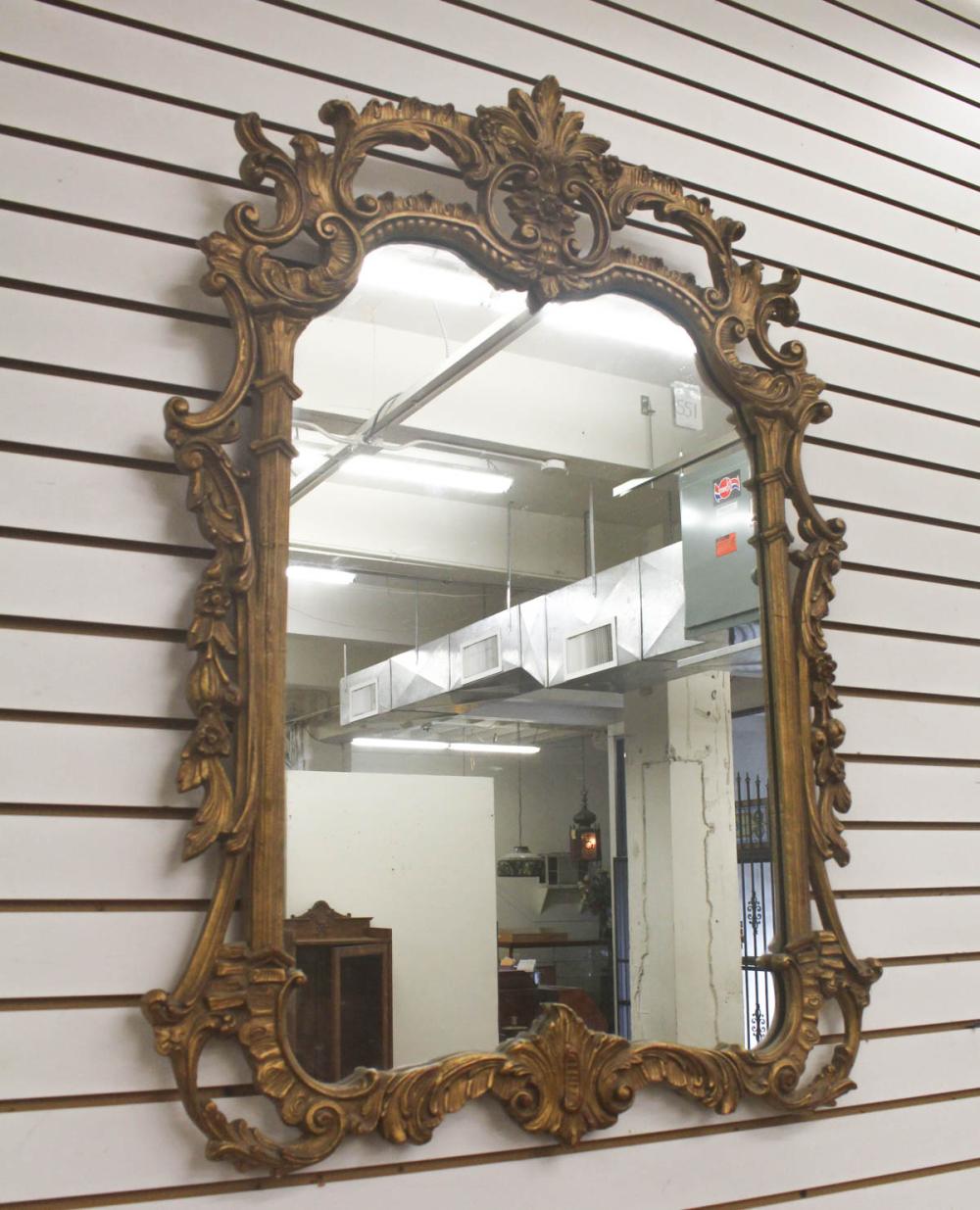 Appraisal: FRENCH-STYLE GILTWOOD AND GESSO FRAMED WALL MIRROR American mid- th