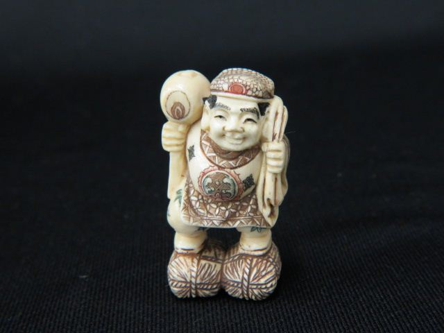 Appraisal: Carved Ivory Netsuke of Daikoku god of weath prosperity hilding