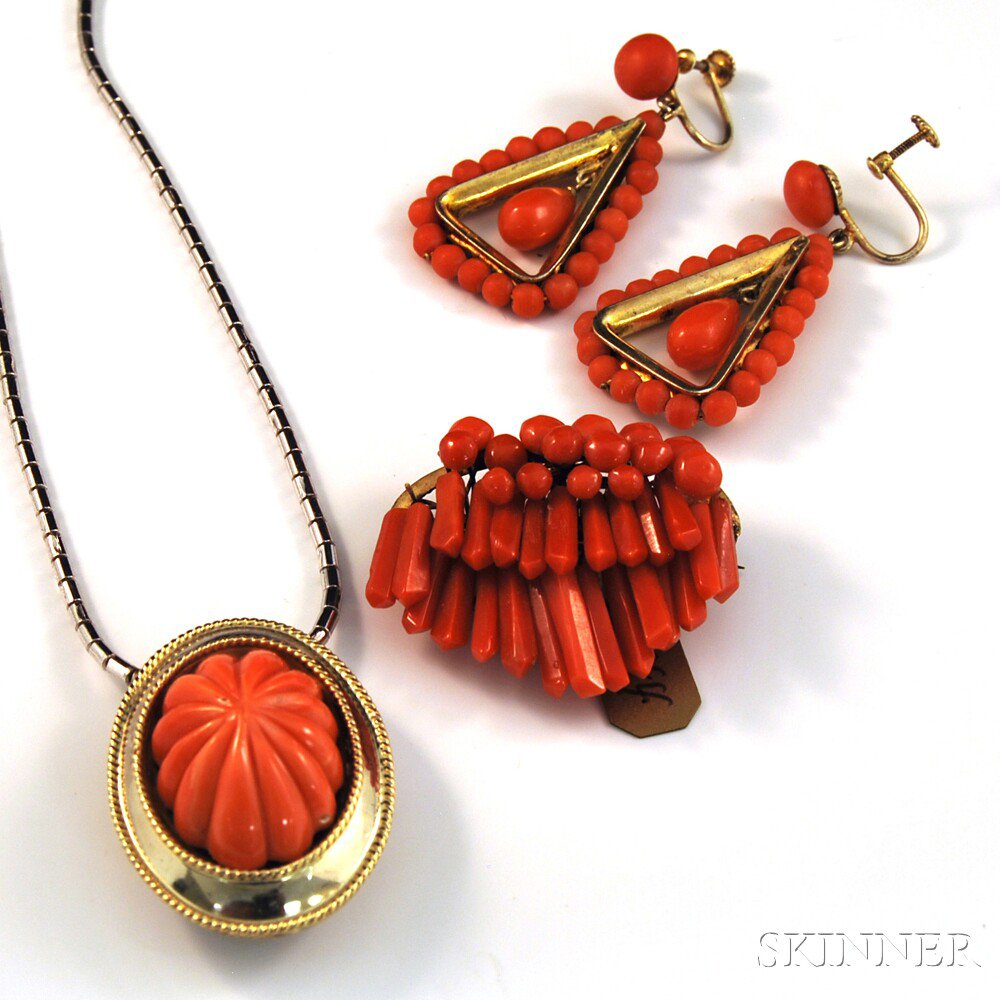 Appraisal: Small Group of Coral Jewelry a carved coral slide on