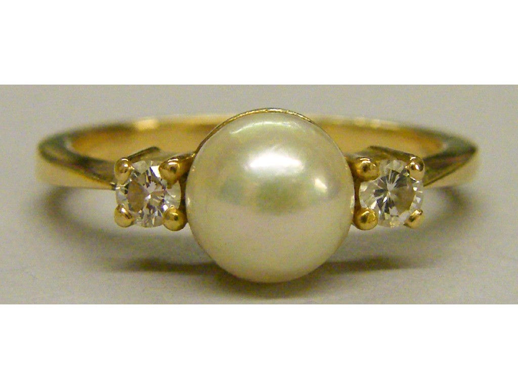 Appraisal: Attractive pearl and diamond three stone ring size L